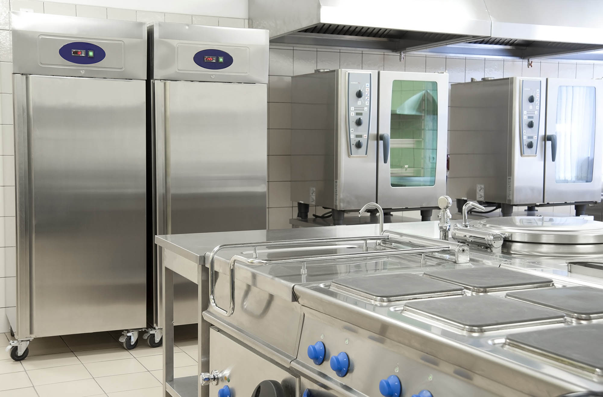 Inside a professional kitchen with new equipment to demonstrate business loans for equipment financing