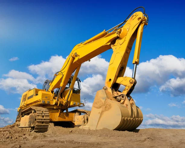 Big excavator in front of the blue sky for Heavy Equipment Financing