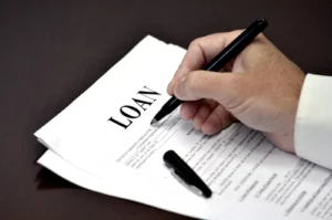 Loan document and agreement with pen for signing loan request letter