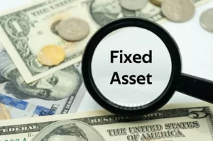 Magnifying glass showing the words Fixed Asset depreciation